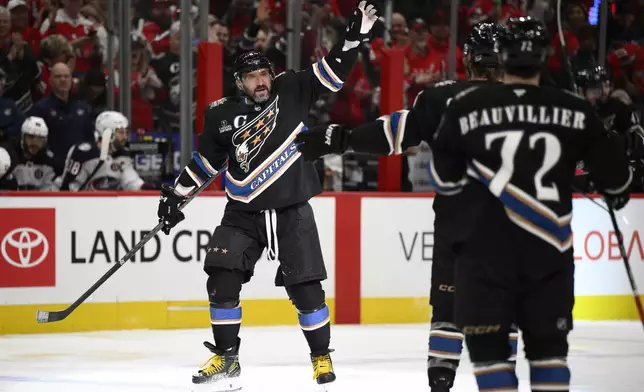 Washington Capitals left wing Alex Ovechkin (8) celebrates his goal during the first period of an NHL hockey game against the Columbus Blue Jackets, Sunday, April 13, 2025, in Washington. (AP Photo/Nick Wass)