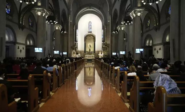 Philippine Cardinal Jose Advincula officiates a Mass for the late Pope Francis at the Manila Cathedral in Manila, Philippines Tuesday, April 22, 2025. (AP Photo/Aaron Favila)