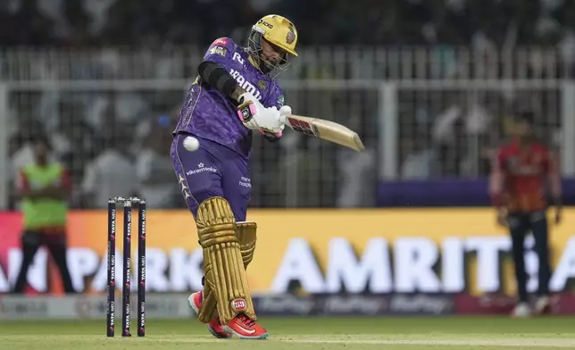 Kolkata Knight Riders' Sunil Narine plays a shot during the Indian Premier League cricket match between Kolkata Knight Riders and Punjab Kings at Eden Gardens in Kolkata in Kolkata , India, Saturday, April 26, 2025. (AP Photo/Bikas Das)