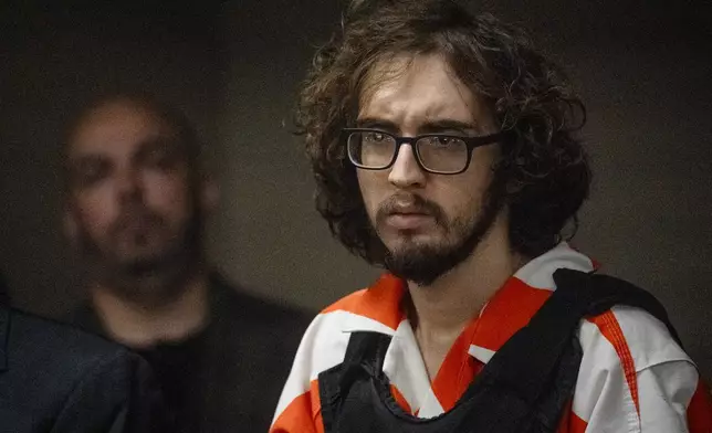 Patrick Crusius stands up to listen to the charges from Judge Sam Medrano in the 409th district Commissioners Courtroom at the Enrique Moreno County Courthosue during his sentencing in El Paso, Texas, April 21, 2025. (Omar Ornelas/Pool Photo via AP)