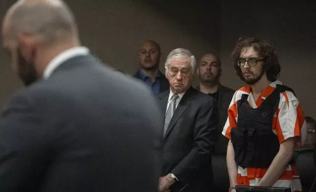 Patrick Crusius stands up to listen to the charges from Judge Sam Medrano in the 409th district Commissioners Courtroom at the Enrique Moreno County Courthosue during his sentencing in El Paso, Texas, April 21, 2025. (Omar Ornelas/Pool Photo via AP)