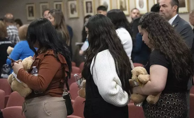 Family members leave the court after a hearing for Patrick Crusius at the Enrique Moreno County Courthouse in El Paso, Texas, Monday, April 21, 2025. (Omar Ornelas/Pool Photo via AP)