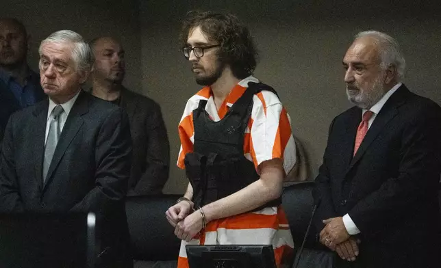 Patrick Crusius stands up to listen to the charges from Judge Sam Medrano in the 409th district Commissioners Courtroom at the Enrique Moreno County Courthosue for his sentencing in El Paso, Texas, April 21, 2025. (Omar Ornelas/Pool Photo via AP)