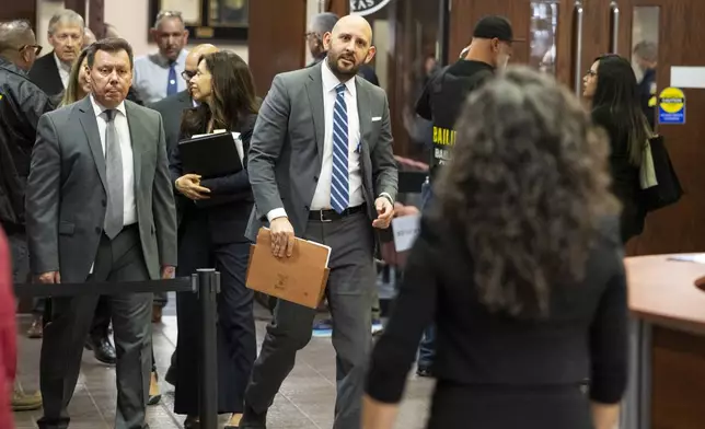El Paso District Attorney James Montoya walks outside the 409th District Court after Patrick Crusius pleaded guilty in the death of 23 people in the Aug. 3. 2019 Walmart Mass shooting, Monday, April 21, 2025, in El Paso, Texas. (AP Photo/Ivan Pierre Aguirre)