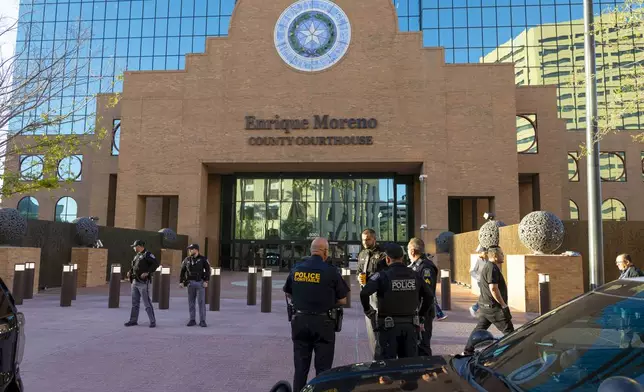 A heavy security presence is seen outside the El Paso County Court House on the day Patrick Crusius is set to plea guilty to the Aug. 3. 2019 Walmart Mass shooting that left 23 dead, Monday, April 21, 2025, in El Paso, Texas. (AP Photo/Ivan Pierre Aguirre)