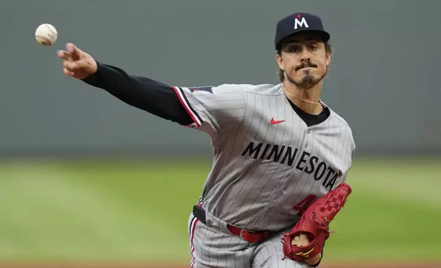 Minnesota Twins starting pitcher Joe Ryan throws during the first inning of a baseball game against the Kansas City Royals, Wednesday, April 9, 2025, in Kansas City, Mo. (AP Photo/Charlie Riedel)