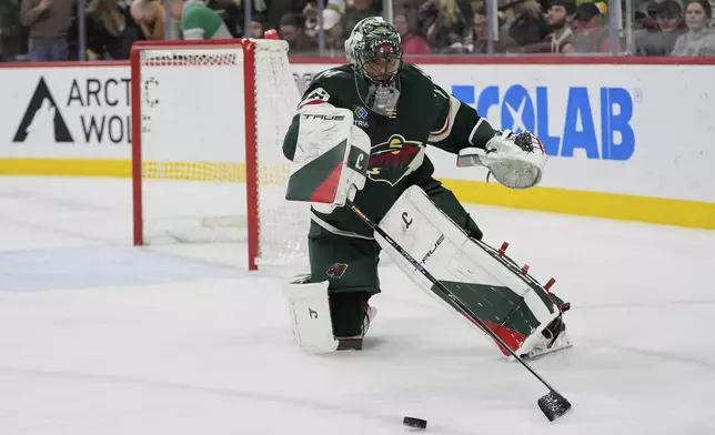 Minnesota Wild goaltender Marc-Andre Fleury (29) stops the puck during the second period of an NHL hockey game against the San Jose Sharks, Wednesday, April 9, 2025, in St. Paul, Minn. (AP Photo/Abbie Parr)