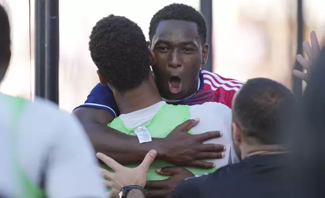 FC Dallas midfielder Anderson Julio (11) celebrates his goal against Inter Miami with teammates during the second half of an MLS soccer match, Sunday, April 27, 2025, in Fort Lauderdale, Fla. (AP Photo/Jim Rassol)