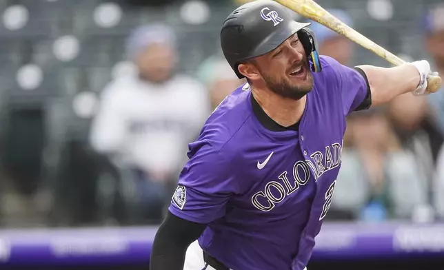 Colorado Rockies' Kris Bryant grounds out against Milwaukee Brewers starting pitcher Freddy Peralta to end the first inning of a baseball game Tuesday, April 8, 2025, in Denver. (AP Photo/David Zalubowski)
