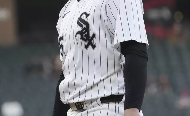 Chicago White Sox first baseman Andrew Vaughn looks to fans before a baseball game against the Milwaukee Brewers in Chicago, Tuesday, April 29, 2025. (AP Photo/Nam Y. Huh)
