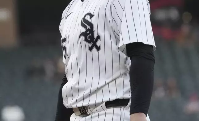 Chicago White Sox first baseman Andrew Vaughn looks to fans before a baseball game against the Milwaukee Brewers in Chicago, Tuesday, April 29, 2025. (AP Photo/Nam Y. Huh)