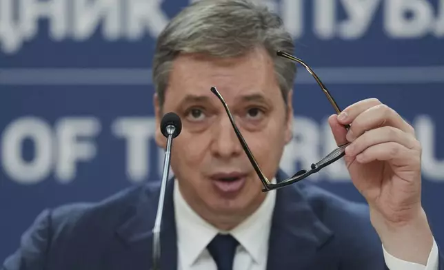 Serbian President Aleksandar Vucic speaks during a public address in Belgrade, Serbia, Wednesday, April 16, 2025. (AP Photo/Darko Vojinovic)