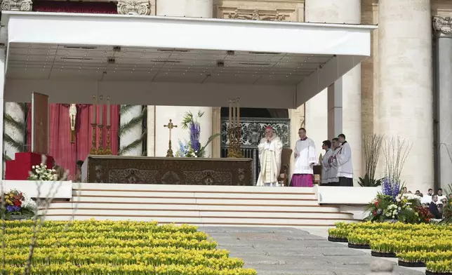 Cardinal Angelo Comastri presides over the Easter mass in St. Peter's Square at the Vatican Sunday, April 20, 2025. (AP Photo/Andrew Medichini)