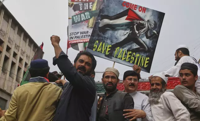 Traders hold a demonstration against Israeli airstrikes and to show solidarity with Palestinian people living in Gaza, in Peshawar, Pakistan Friday, April 18, 2025. (AP Photo/Muhammad Sajjad)