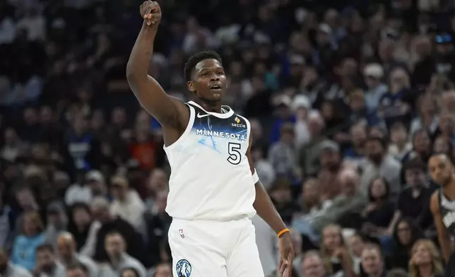 Minnesota Timberwolves guard Anthony Edwards looks on after missing a basket during the first half of an NBA basketball game against the Brooklyn Nets, Friday, April 11, 2025, in Minneapolis. (AP Photo/Abbie Parr)