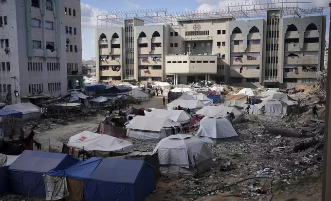Tents for displaced Palestinians are set up at the Islamic University of Gaza compound amid the ongoing conflict in Gaza, Saturday, April 5, 2025. (AP Photo/Jehad Alshrafi)