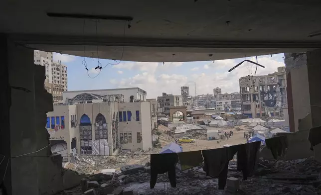 A view of the Islamic University in Gaza City, partially damaged by an Israeli bombardment and now serving as a shelter for displaced Palestinians amid the ongoing conflict in Gaza, Saturday, April 5, 2025. (AP Photo/Jehad Alshrafi)