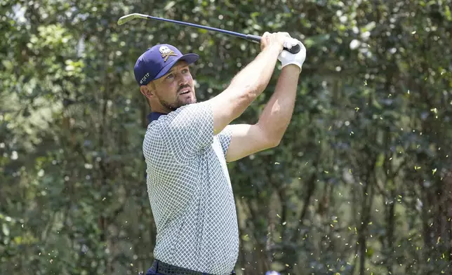 Captain Bryson DeChambeau, of Crushers GC, hits from the fourth tee during the second round of LIV Golf Mexico City at Club de Golf Chapultepec, Saturday, April 26, 2025, in Naucalpan, Mexico. (Jon Ferrey/LIV Golf via AP)