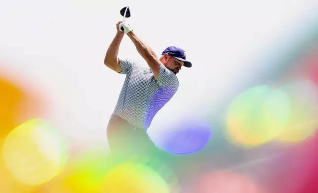 Captain Bryson DeChambeau, of Crushers GC, hits on the driving range during the second round of LIV Golf Mexico City at Club de Golf Chapultepec, Saturday, April 26, 2025, in Naucalpan, Mexico. (Chris Trotman/LIV Golf via AP)