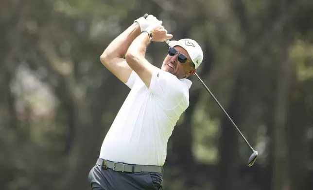 Captain Phil Mickelson, of HyFlyers GC, hits from the 12th tee during the second round of LIV Golf Mexico City at Club de Golf Chapultepec, Saturday, April 26, 2025, in Naucalpan, Mexico. (Charles Laberge/LIV Golf via AP)