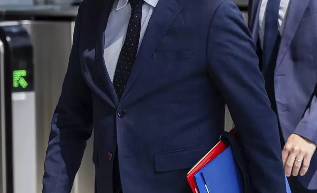 French Defense Minister Sebastien Lecornu arrives for a coalition of the willing defence ministers meeting at NATO headquarters in Brussels, Belgium, Thursday, April 10, 2025. (AP Photo/Geert Vanden Wijngaert)