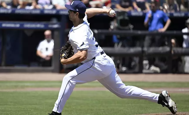 Tampa Bay Rays pitcher Joe Boyle throws during the first inning of a baseball game against the Atlanta Braves, Sunday, April 13, 2025, in Tampa, Fla. (AP Photo/Jason Behnken)