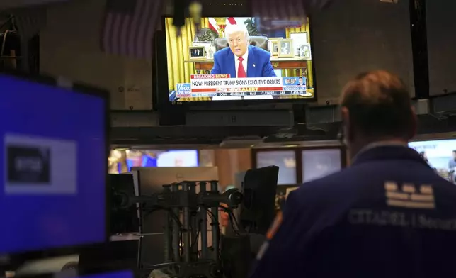 President Donald Trump is displayed on a television on the floor at the New York Stock Exchange in New York, Wednesday, April 9, 2025. (AP Photo/Seth Wenig)