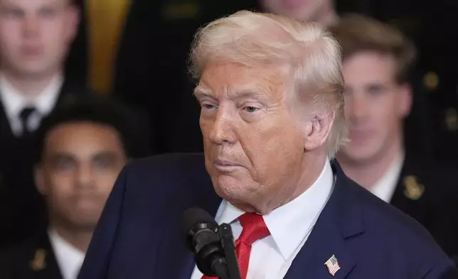 President Donald Trump speaks during the Commander-in-Chief trophy presentation to the Navy Midshipman football team in the East Room of the White House, Tuesday, April 15, 2025, in Washington. (AP Photo/Alex Brandon)