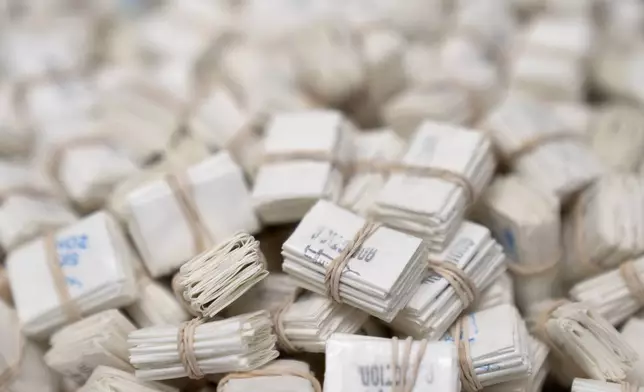 Glassine envelopes used to package fentanyl pills or fentanyl powder are displayed at a Drug Enforcement Administration (DEA) research laboratory on Tuesday, April 29, 2025, in Northern Virginia. (AP Photo/Mark Schiefelbein)