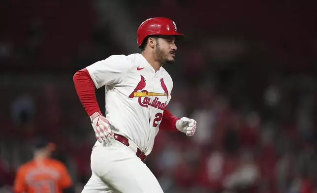 St. Louis Cardinals' Nolan Arenado rounds the bases after hitting a solo home run during the seventh inning of a baseball game against the Houston Astros Monday, April 14, 2025, in St. Louis. (AP Photo/Jeff Roberson)