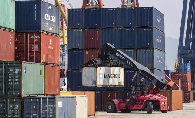 Containers pile up at Kwai Chung Container terminal in Hong Kong, Tuesday, Apr. 8, 2025. (AP Photo/Chan Long Hei)