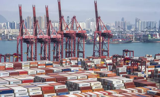 Containers pile up at Kwai Chung Container terminal in Hong Kong, Tuesday, Apr. 8, 2025. (AP Photo/Chan Long Hei)