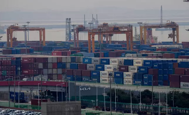Cranes and shipping containers are seen at a port in Pyeongtaek, South Korea, Wednesday, April 9, 2025. (AP Photo/Lee Jin-man)