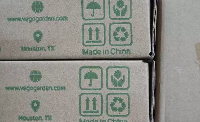 Made in China labels are shown on products in Carmel, Ind., Wednesday, April 9, 2025. (AP Photo/Michael Conroy)