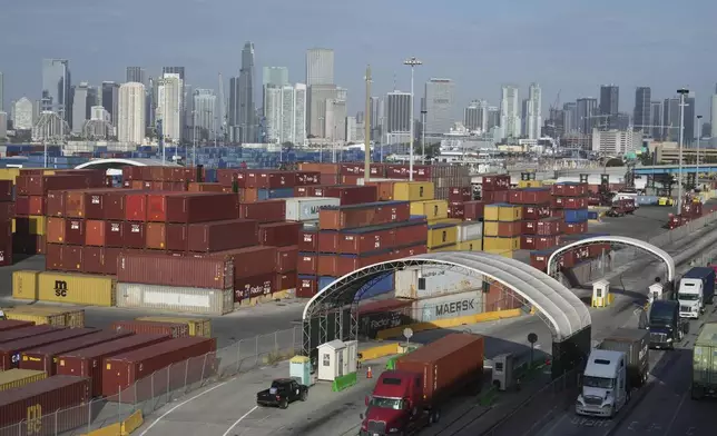 Trucks arrive at Port Miami, Tuesday, April 8, 2025, in Miami. (AP Photo/Marta Lavandier)