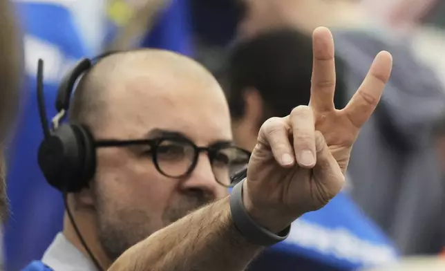 A trader works on the options trading floor at the Cboe in Chicago, Tuesday, April 8, 2025. (AP Photo/Nam Y. Huh)
