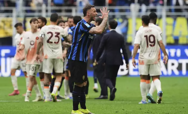 Inter Milan's Marko Arnautovic reacts at the end of the Serie A soccer match between Inter Milan and Roma at the San Siro Stadium, in Milan, Italy, Sunday, April 27, 2025. (AP Photo/Antonio Calanni)