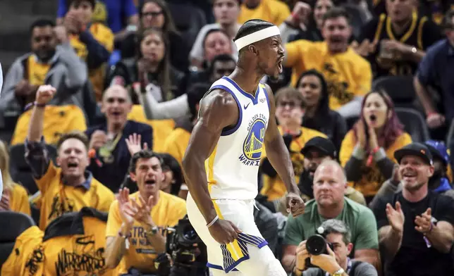 Golden State Warriors' Jimmy Butler III (10) celebrates a made basket and foul against the Memphis Grizzlies during the the first half of an NBA play-in tournament basketball game in San Francisco, Tuesday, April 15, 2025. (Carlos Avila Gonzalez/San Francisco Chronicle via AP)