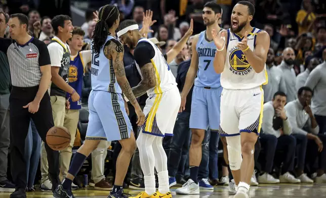 Golden State Warriors' Stephen Curry (30) celebrates a turnover by the Memphis Grizzlies in the second half of an NBA play-in tournament basketball game in San Francisco, Tuesday, April 15, 2025. (Carlos Avila Gonzalez/San Francisco Chronicle via AP)