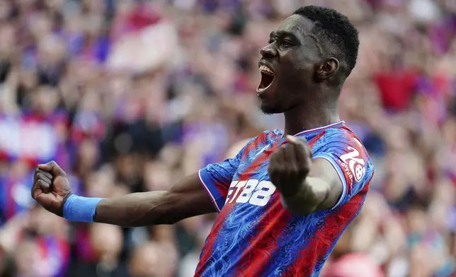 Crystal Palace's Ismaila Sarr celebrates after scoring his side's second goal during the English FA Cup semifinal soccer match between Crystal Palace and Aston Villa at the Wembley stadium in London, Saturday, April 26, 2025. (Mike Egerton/PA via AP)