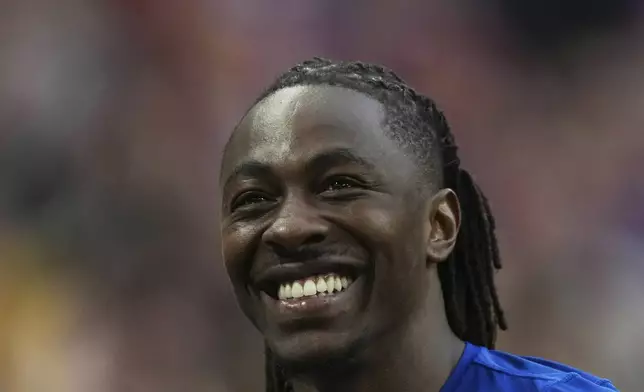 Crystal Palace's Eberechi Eze celebrates his Man of the Match Award during the English FA Cup semifinal soccer match between Crystal Palace and Aston Villa at the Wembley stadium in London, Saturday, April 26, 2025. (AP Photo/Dave Shopland)