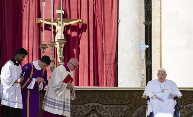 Pope Francis arrives on a wheelchair at the end of a mass in St. Peter's Square at The Vatican, Sunday, April 6, 2025, part of the jubilee of the sick and the health workers. (AP Photo/Andrew Medichini)
