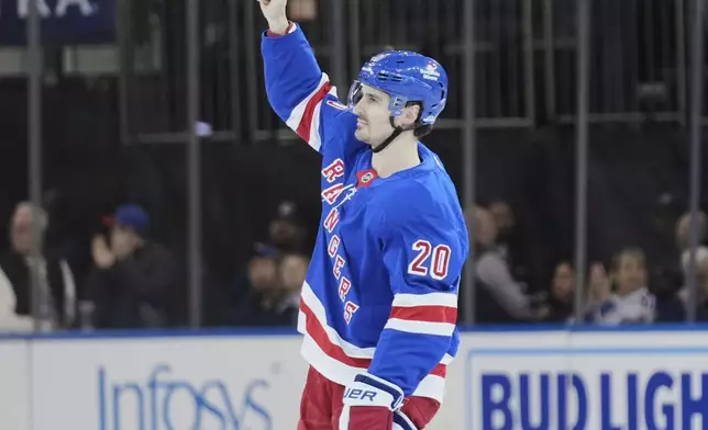 New York Rangers' Chris Kreider reacts to the crowd after an NHL hockey game Tampa Bay Lightning in New York, Thursday, April 17, 2025. (AP Photo/Seth Wenig)