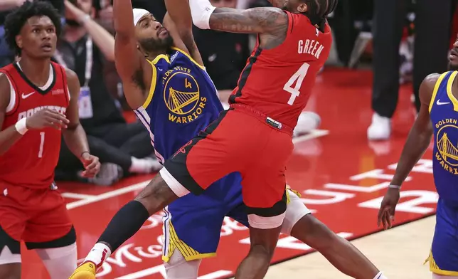 Golden State Warriors' Moses Moody (4) defends against Houston Rockets' Jalen Green (4) during the second half of Game 1 of an NBA basketball first-round playoff series in Houston, Sunday, April 20, 2025. (Scott Strazzante/San Francisco Chronicle via AP)