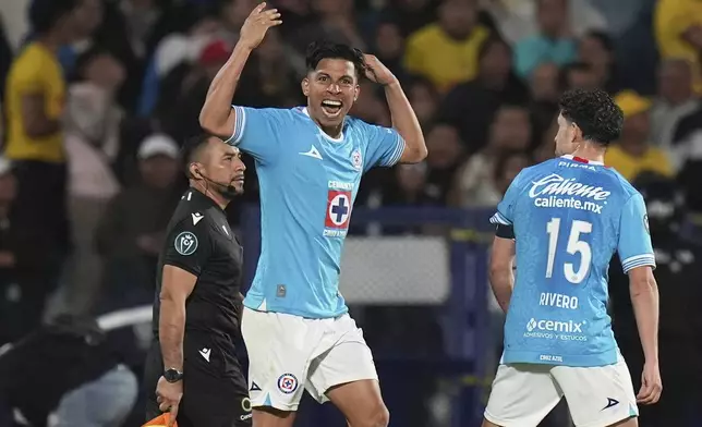 Angel Sepulveda of Mexico's Cruz Azul celebrates scoring his side's 2nd goal against Mexico's America during a CONCACAF Champions Cup second leg quarterfinal soccer match in Mexico City, Tuesday, April 8, 2025. (AP Photo/Eduardo Verdugo)