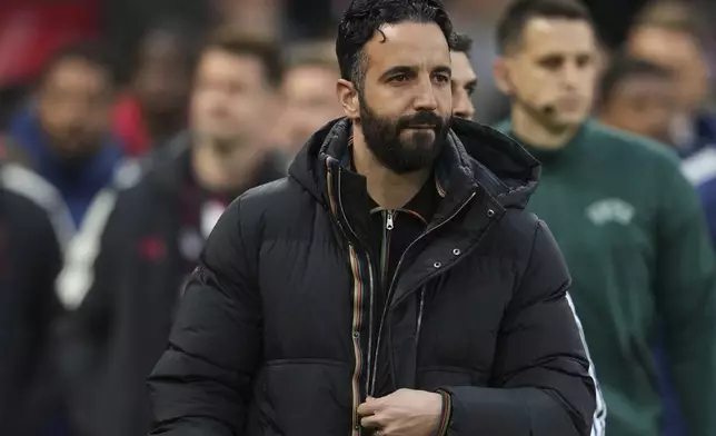 Manchester United's head coach Ruben Amorim arrives for the Europa League quarter final second leg soccer match between Manchester United and Olympique Lyon in Manchester, Britain, Thursday, April 17, 2025. (AP Photo/Jon Super)