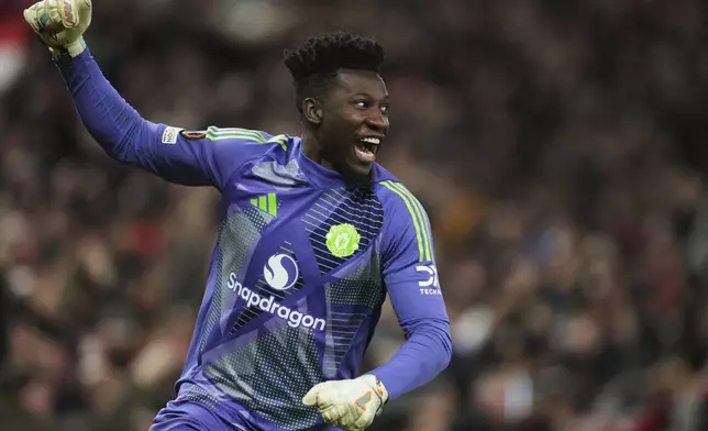 Manchester United's goalkeeper Andre Onana celebrates during the Europa League quarter final second leg soccer match between Manchester United and Olympique Lyon in Manchester, Britain, Thursday, April 17, 2025. (AP Photo/Jon Super)