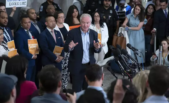 Sen. Chris Van Hollen, D-Md., speaks during a news conference upon his arrival from meeting with Kilmar Abrego Garcia in El Salvador, at Washington Dulles International Airport, in Chantilly, Va., Friday, April 18, 2025. (AP Photo/Jose Luis Magana)
