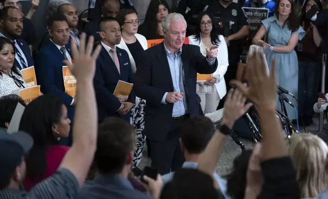Sen. Chris Van Hollen, D-Md., speaks during a news conference upon his arrival from meeting with Kilmar Abrego Garcia in El Salvador, at Washington Dulles International Airport, in Chantilly, Va., Friday, April 18, 2025. (AP Photo/Jose Luis Magana)