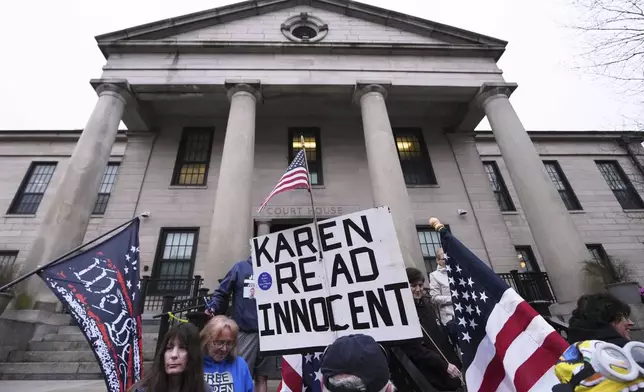 Supporters of Karen Read gather on the steps at Norfolk Superior Court prior to Read's trial, Tuesday, April 22, 2025, in Dedham, Mass. (AP Photo/Charles Krupa)